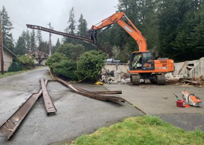 Home demolition in Shelton